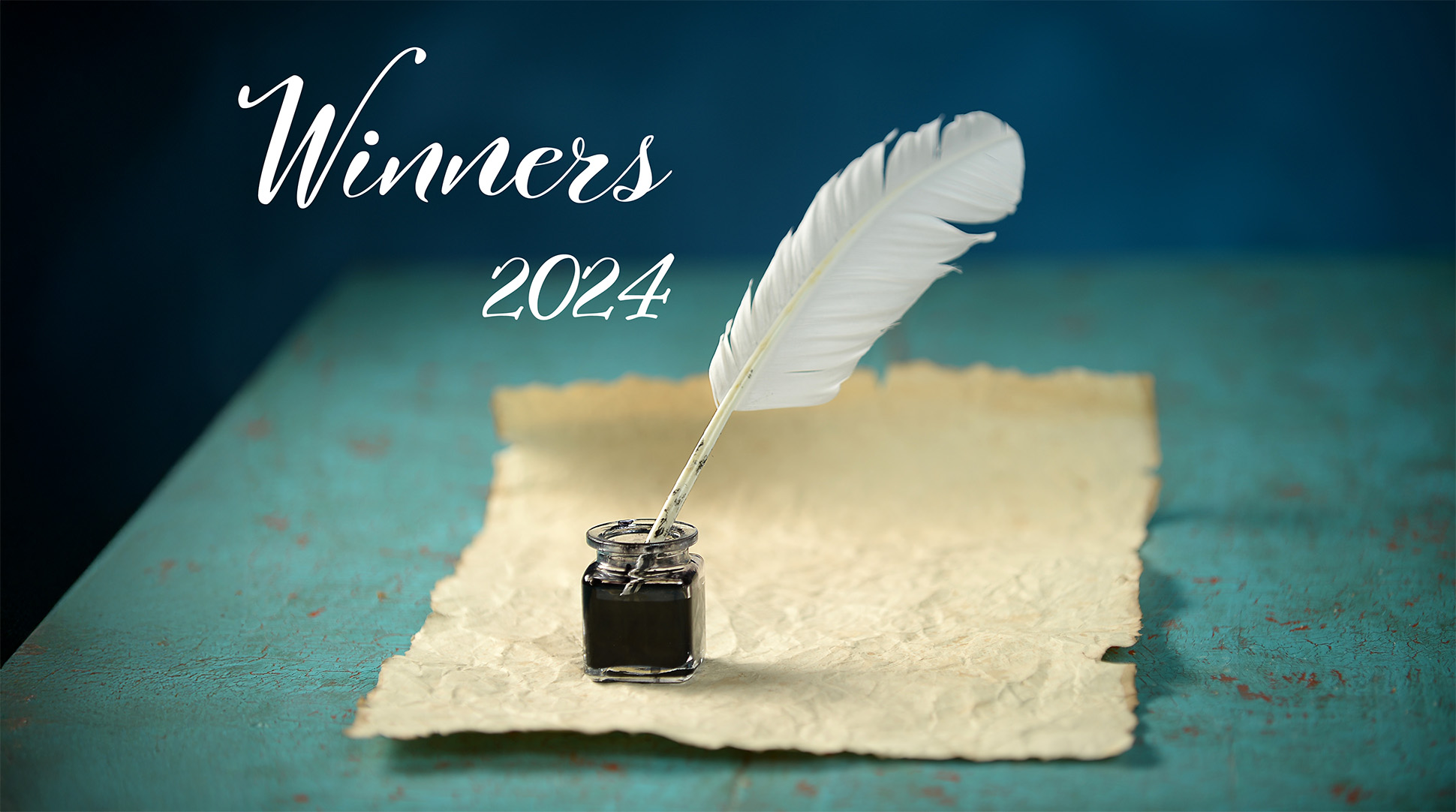 A parchment and quill with the title Winners 2024 superimposed.