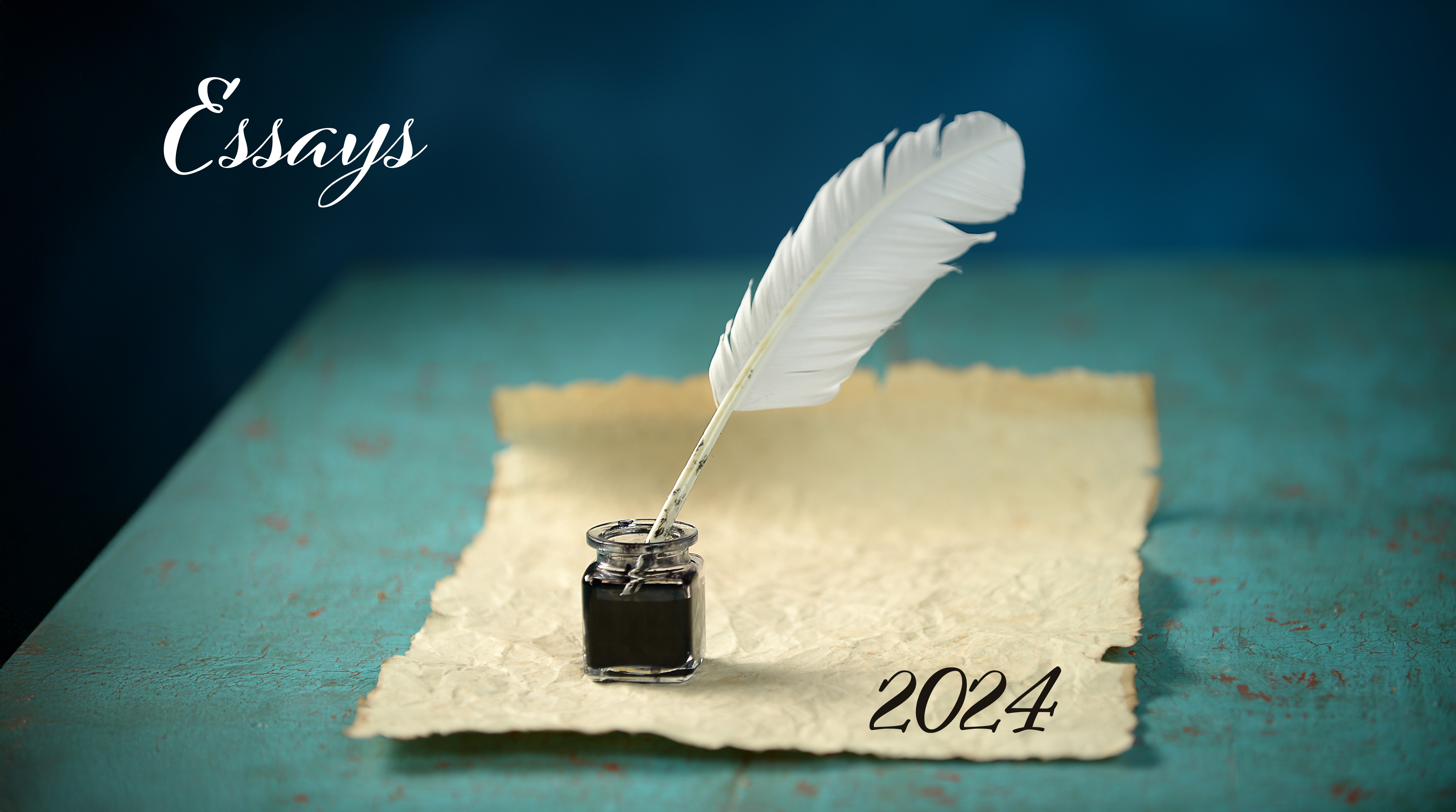 Parchment and quill with word Essays 2024 superimposed