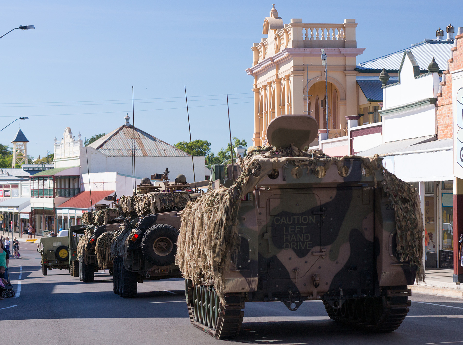 Anzac Day parade showing armoured vehicles