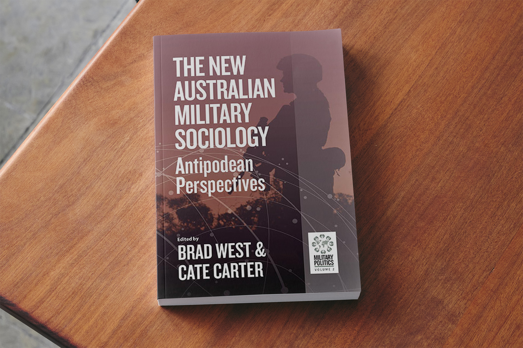 Book Cover of The New Australian Military, lying on a coffee table