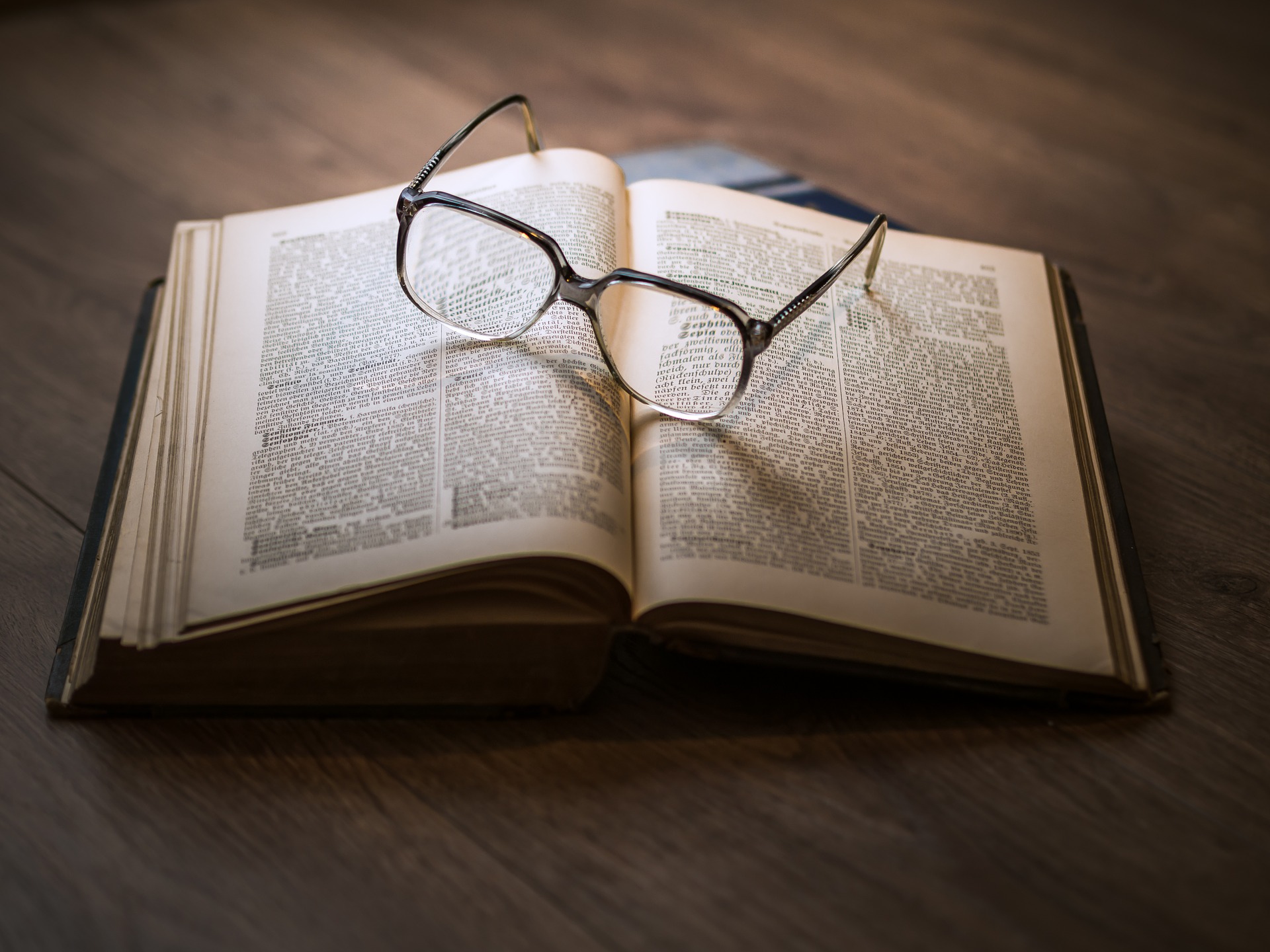 Open book Spectacles on an open book