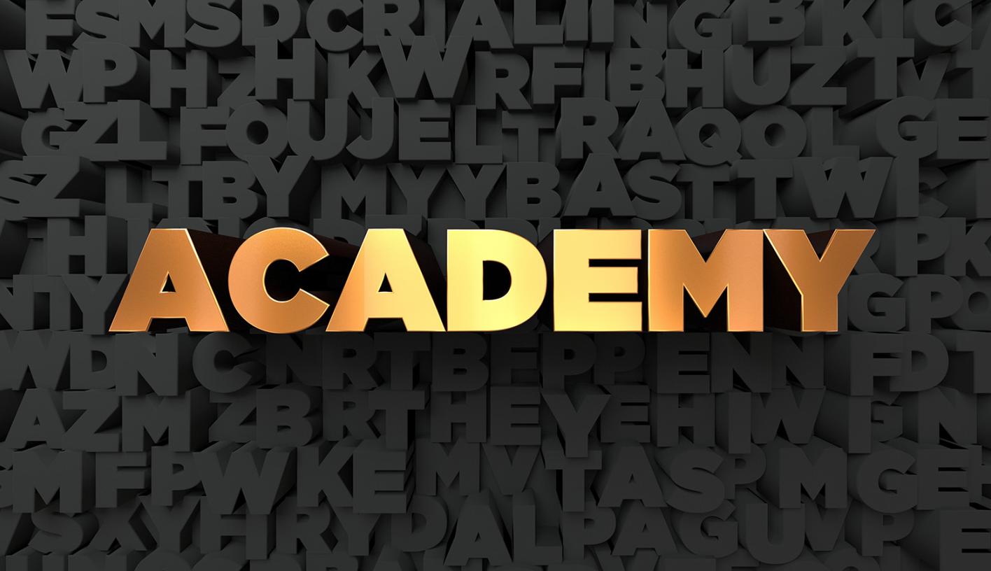 The word Academy in gold letters