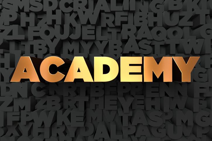 The word Academy in gold letters