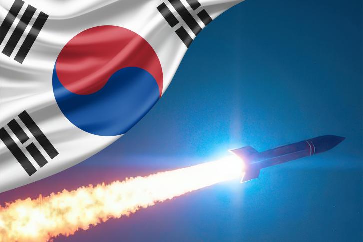 The South Korean Flag over a nuclear missle in flight