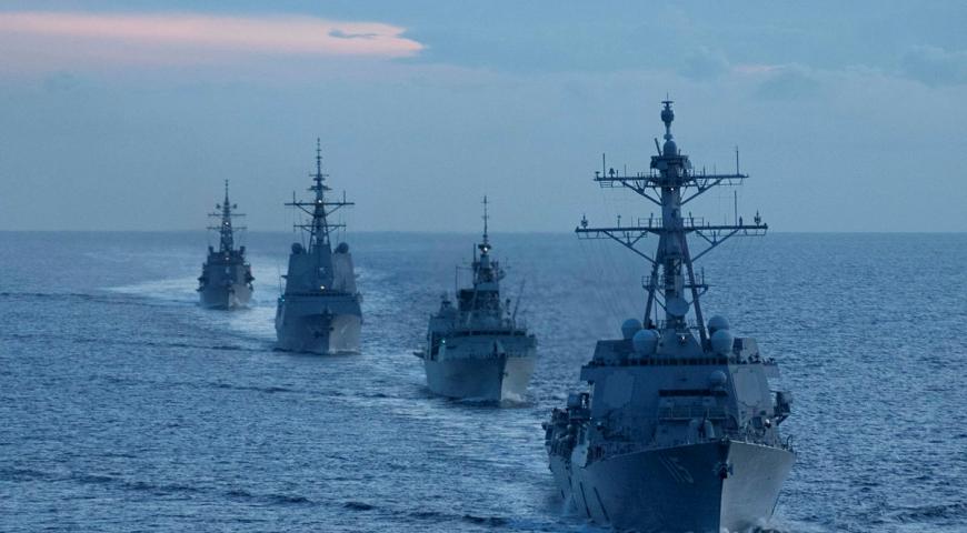United States Navy Arleigh Burke-class destroyer USS Rafael Peralta leads a formation sail.