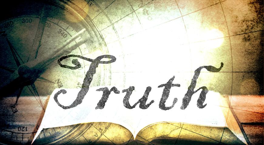 The word truth floating over a glowing book with a compass in the background