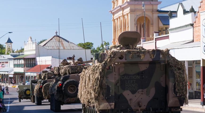 Anzac Day parade showing armoured vehicles