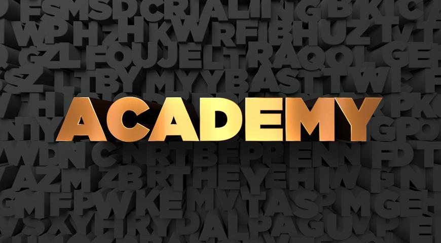 The word Academy in gold letters