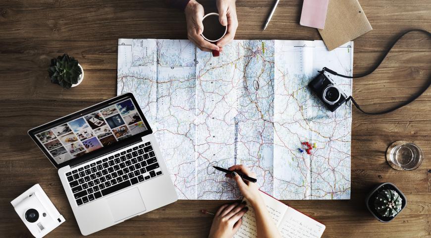 People working over a map