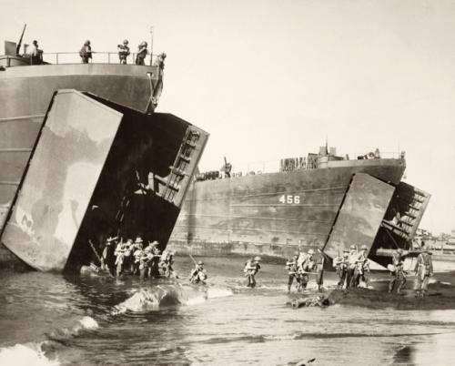 Photo of the troops leaving the landing ships.