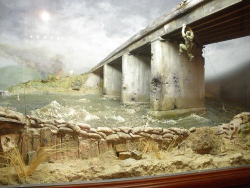 Diorama in Bancroft Hall at US Naval Academy, Captain John Ripley Blowing up the Đông Hà bridge. Public Domain Imagery