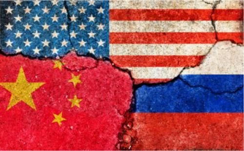 A cracked wall with fractured versions of eth US, CVhina and Russian flags painted on it.