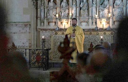 Evening Service - a priest talking to a congregation of uniformed soldiers