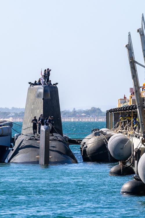 The Astute-class submarine HMS Anson comes alongside at HMAS Stirling in Western Australia, for a scheduled Submarine Maintenance Period (SMP).